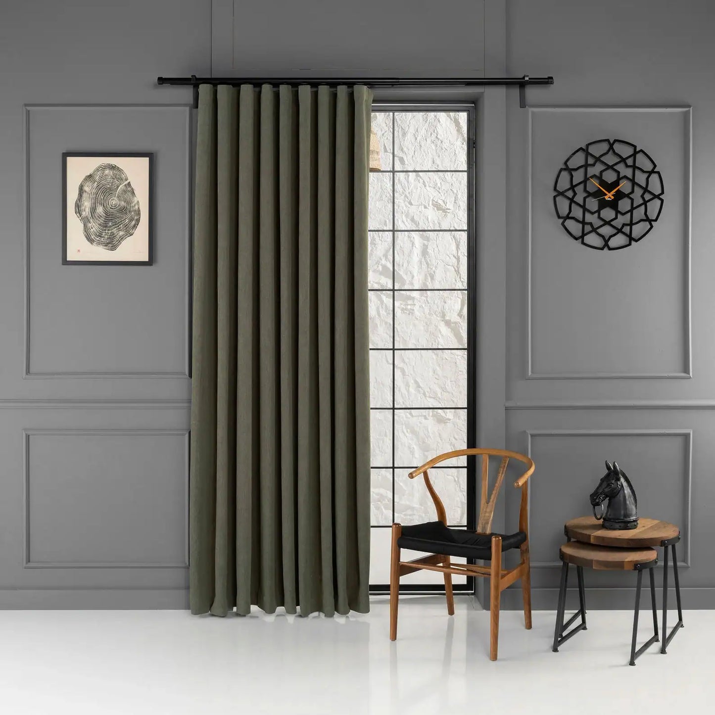 Full view of the curtain panels in a room setting featuring 100% Blackout Pleated Linen Curtain Panels in Olive Green.