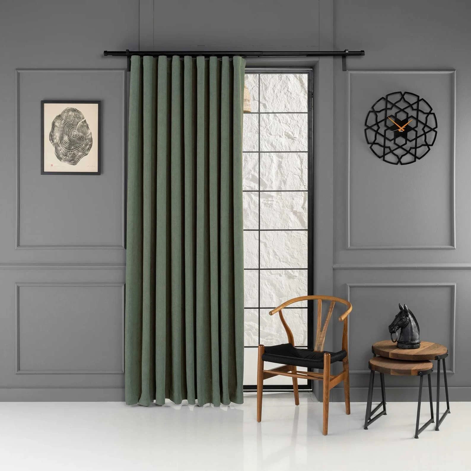 Full view of the curtain panels in a room setting of 100% Blackout Pleated Linen Curtain Panels in Matcha Green.